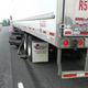 Illustration for article titled Mustang Driver Somehow Uninjured After Getting Wedged Under Semi, Dragged